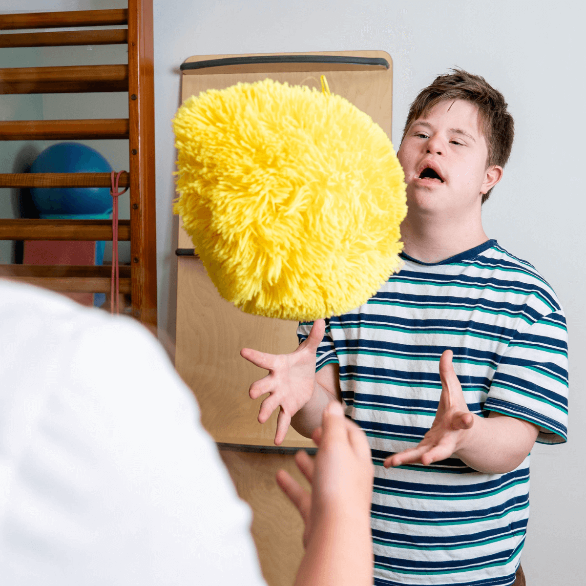 Bronzwaer Fysiotherapie en Kinderfysiotherapie oefening behandeling bij cliënt met syndroom van Down